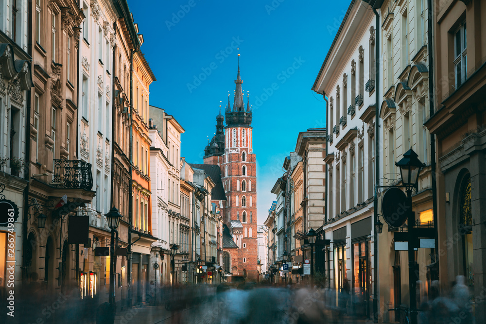 Krakow, Poland. View Of The St. Mary's Basilica From Florian Street. Famous Landmark Old Landmark Church Of Our Lady Assumed Into Heaven. Saint Mary's Church