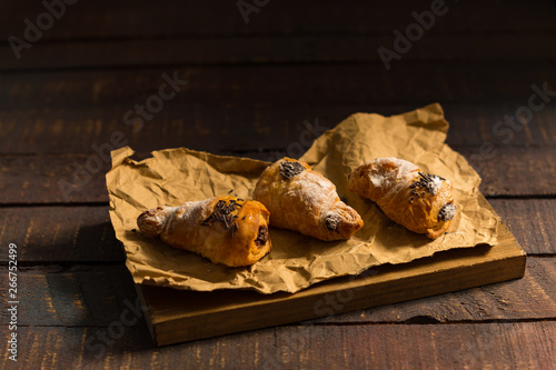 Three mini croissants with chocolate