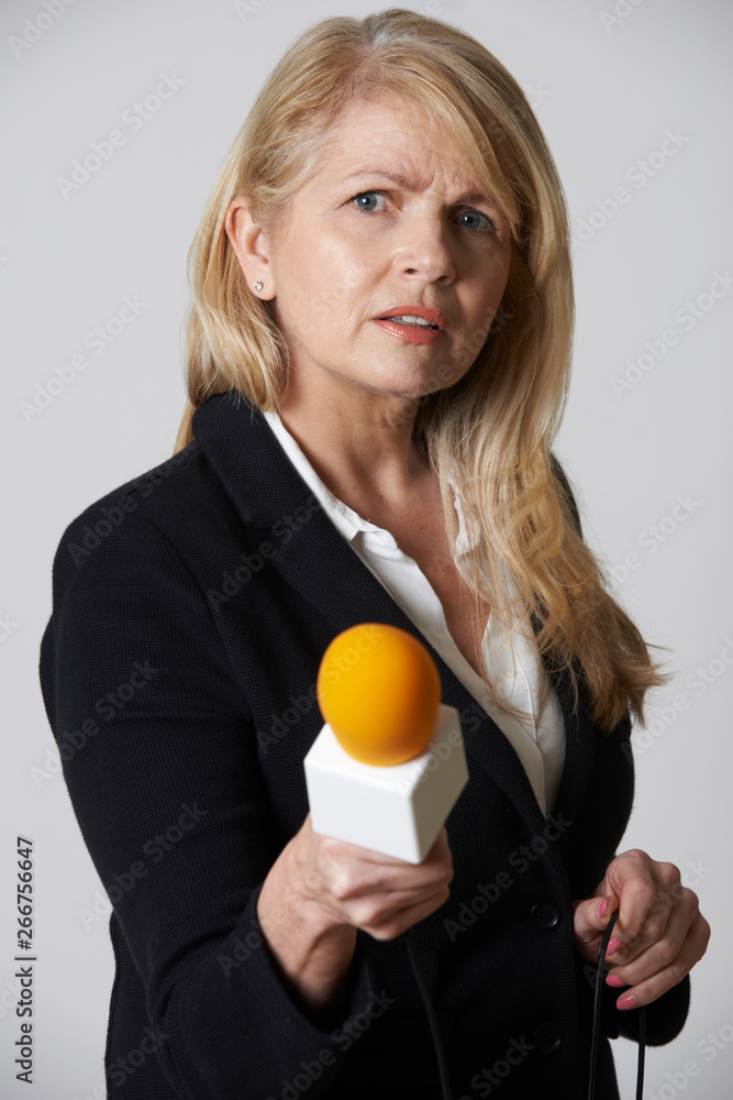 Female Journalist With Microphone On White Background Female Journalist With Microphone On White Background