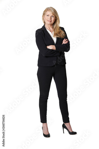 Full Length Portrait Of Portrait Of Mature Businesswoman Against White Background