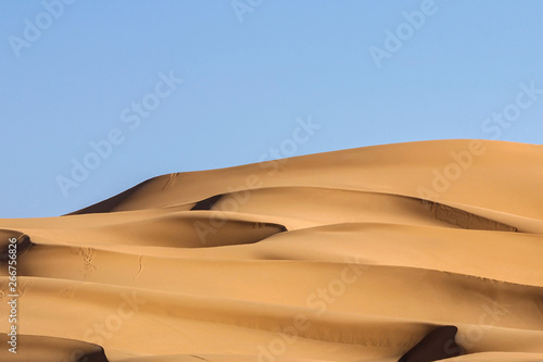landscape of golden sand dune in Sahara desert, Morocco