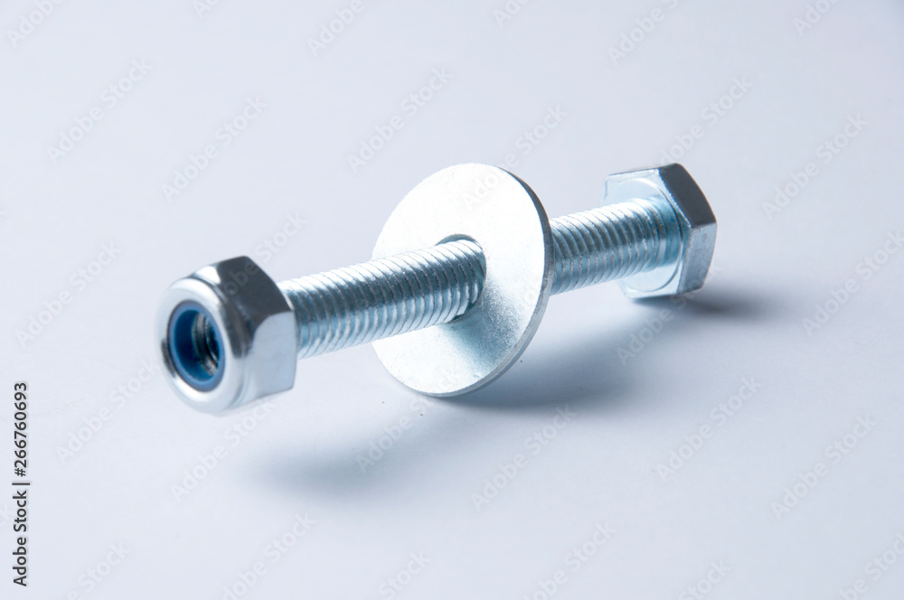 Metal bolt and nuts isolated on white background Metal bolt and nuts isolated on white background