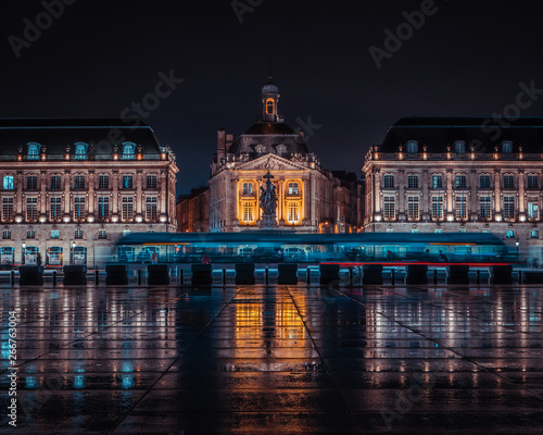 Fotografie Modern city tramway during night front of Place de la Bourse at Bordeaux