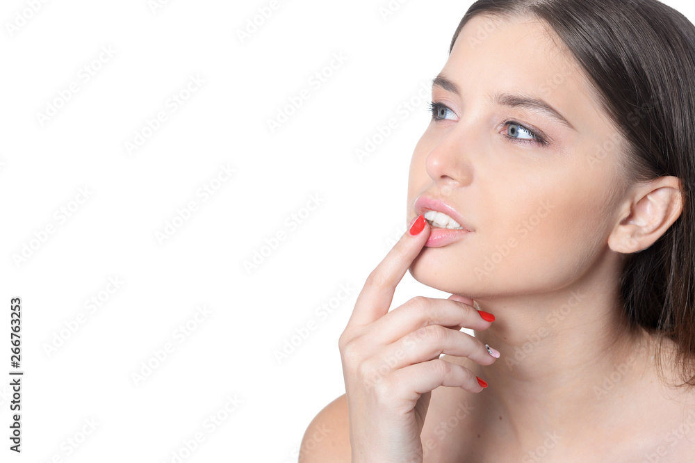 Portrait of beautiful young woman posing isolated on white Portrait of beautiful young woman posing isolated on white