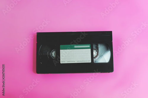 video vhs retro vintage cassette tape 70s, 80s, 90s style on pink background