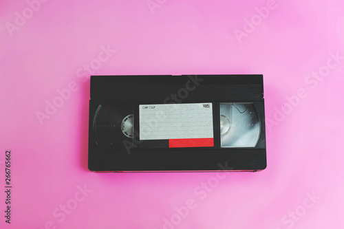 video vhs retro vintage cassette tape 70s, 80s, 90s style on pink background