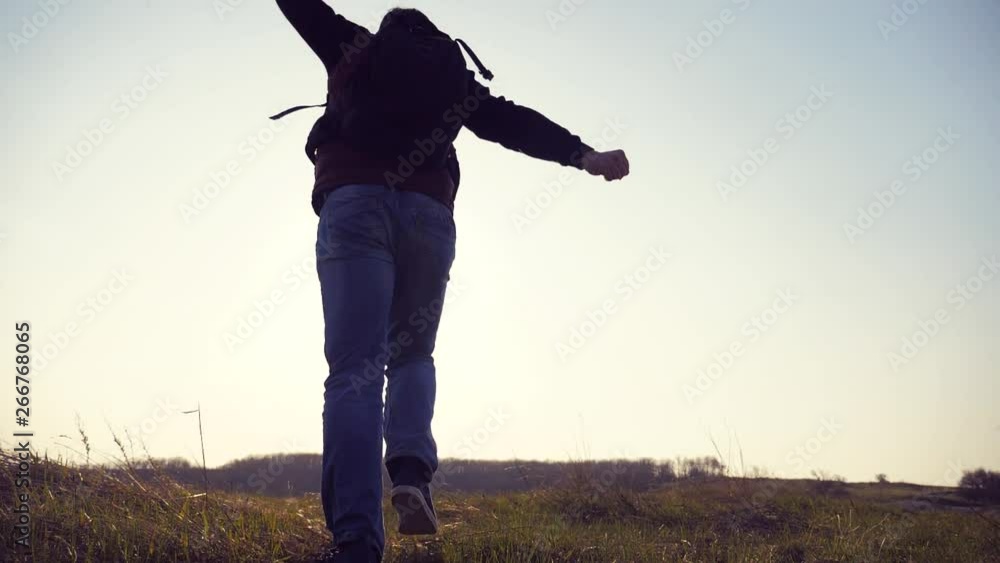 teamwork happiness business travel silhouette concept. group hikers of people happy run and jump slow motion video walking in a field on trekking trip. lifestyle tourists with backpacks traveling teamwork happiness business travel silhouette concept. group hikers of people happy run and jump slow motion video walking in a field on trekking trip. lifestyle tourists with backpacks traveling