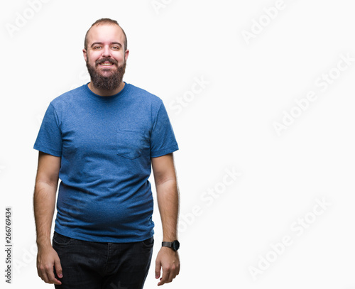 Young caucasian hipster man over isolated background with a happy and cool smile on face. Lucky person. © Krakenimages.com