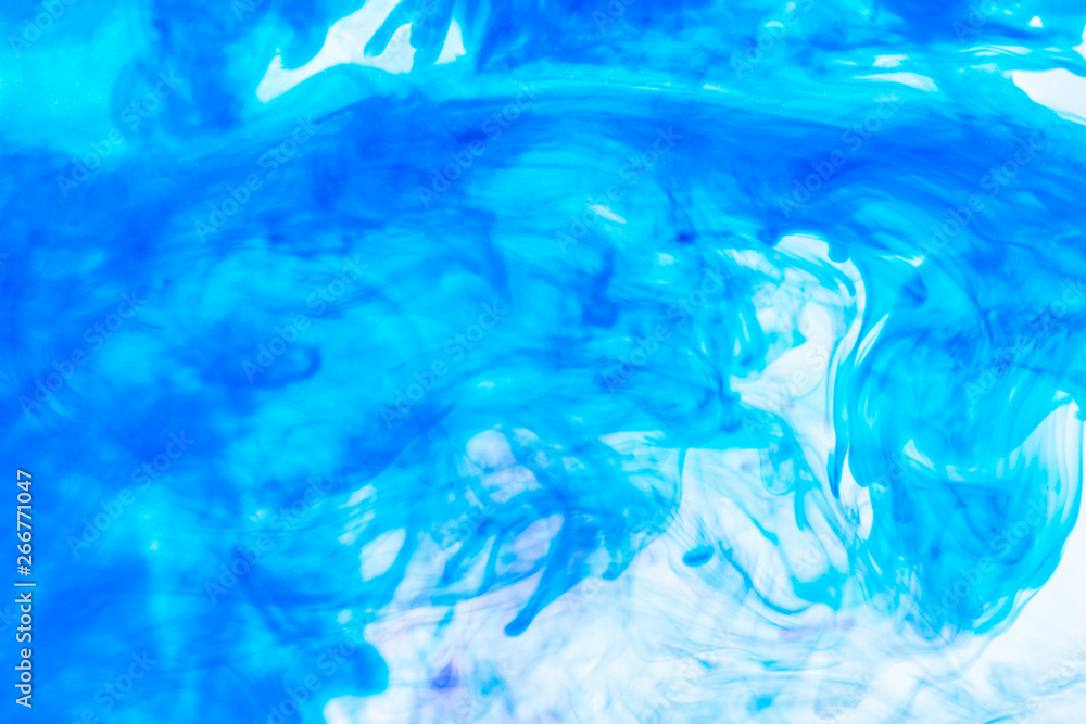 Ink in water. Watercolor background image with a blue liquid Ink in water. Watercolor background image with a blue liquid