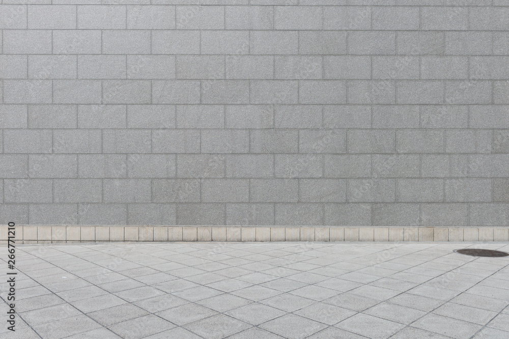 Fototapeta premium tło ściana ulicy, tło przemysłowe, pusta grunge miejska ulica z murem magazynu