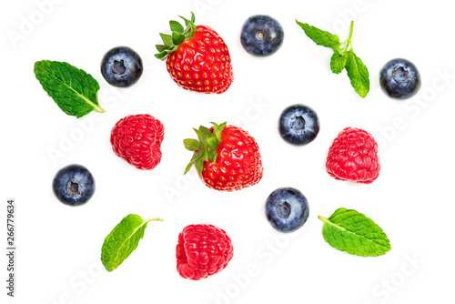 Various fresh summer berries  isolated on white background  top view. Strawberry  Raspberry  Blueberry and Mint leaf  flat lay
