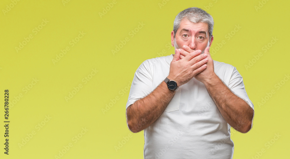 Handsome senior man over isolated background shocked covering mouth with hands for mistake. Secret concept. Handsome senior man over isolated background shocked covering mouth with hands for mistake. Secret concept.