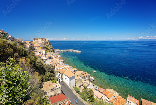 Fototapeta Naklejka Na Ścianę i Meble -  Panorama with beautiful coastline and old castle of medieval town of Scilla in Calabria, Italy. Italian summer travel holiday.
