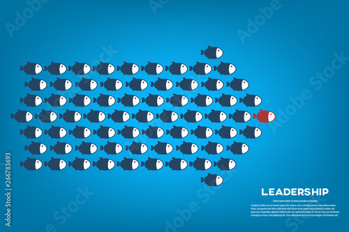Red fish as a leader among others, leadership, teamwork, motivation, stand out of the crowd concept, EPS10 vector