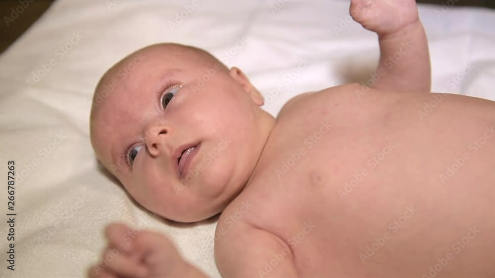 Newborn baby waving his arms. Close-up. Newborn baby waving his arms. Close-up.