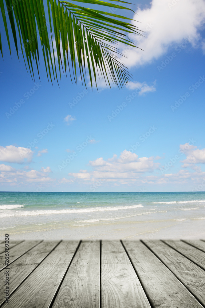 Fototapeta premium Beach background with palm tree and empty wooden, Summer.