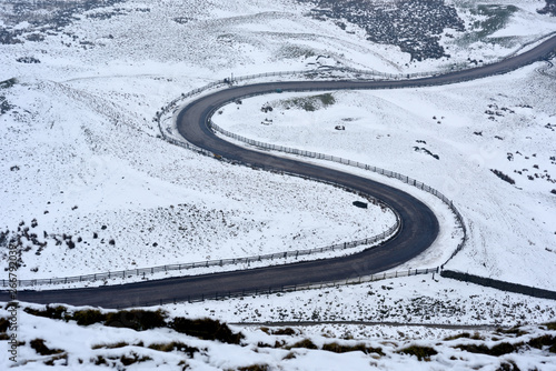 Derbyshire Peak District in the UK roads and hiking trails in Winter. photo