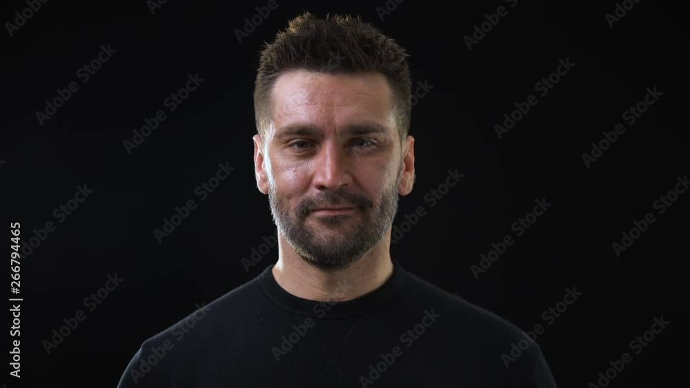 Smiling caucasian man looking camera, sweet memories, feeling calm, missing Smiling caucasian man looking camera, sweet memories, feeling calm, missing