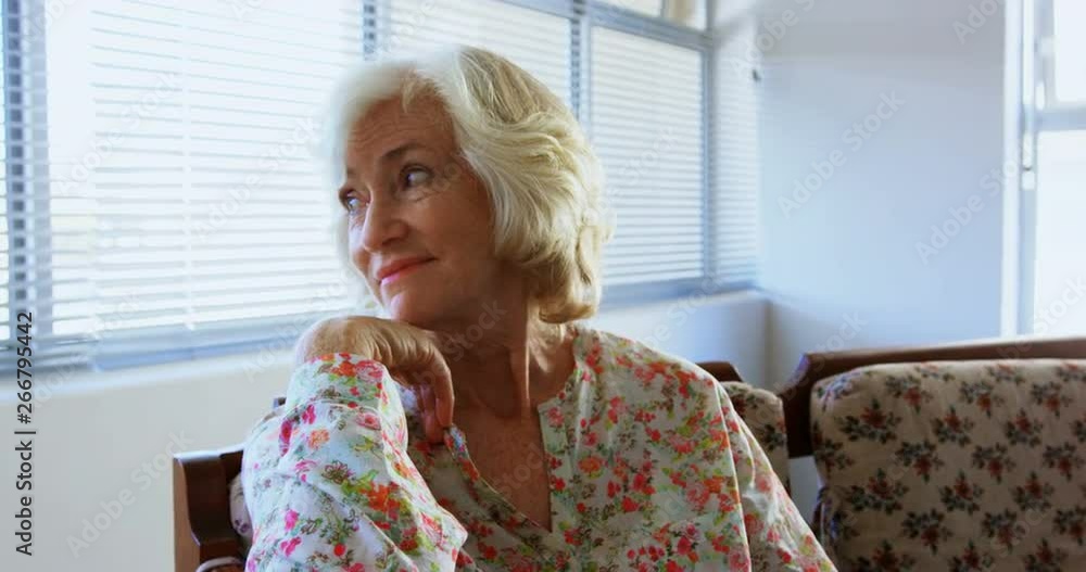 Front view of active Caucasian senior woman relaxing at nursing home 4k Front view of active Caucasian senior woman relaxing at nursing home 4k