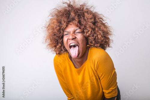 pretty Afro woman showing her tongue photo