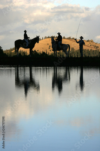 Reflection of cowboys