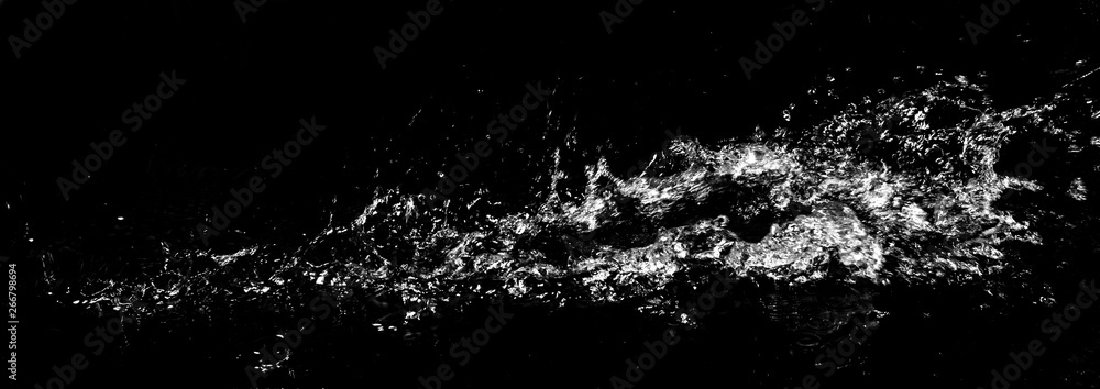 Splash of water. Isolate on black background Splash of water. Isolate on black background