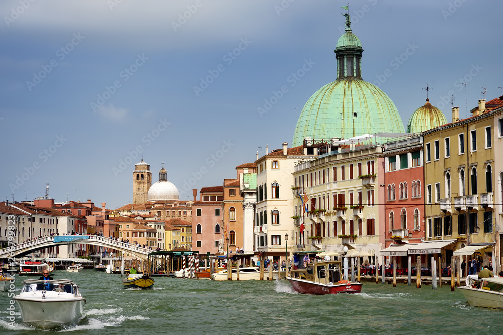 VENICE, ITALY - APRIL 24, 2019: View of Grand Canal, Scalzi bridge, San Simeon Piccolo's Church of Venice