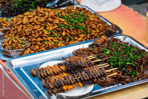 Fried insects for sale in local market, Thailand.