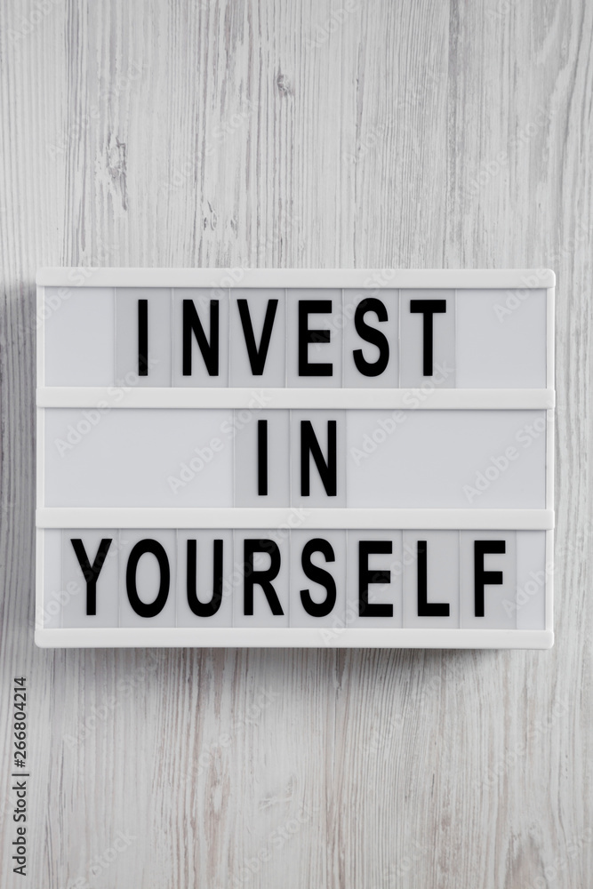 Lightbox with 'You are your only limit' words over white wooden background, top view. Overhead, flat lay, from above. Lightbox with 'You are your only limit' words over white wooden background, top view. Overhead, flat lay, from above.