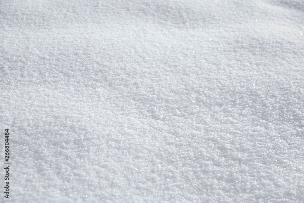 Natural snowy texture, winter background. Frosty weather with loose snow surface in wintertime