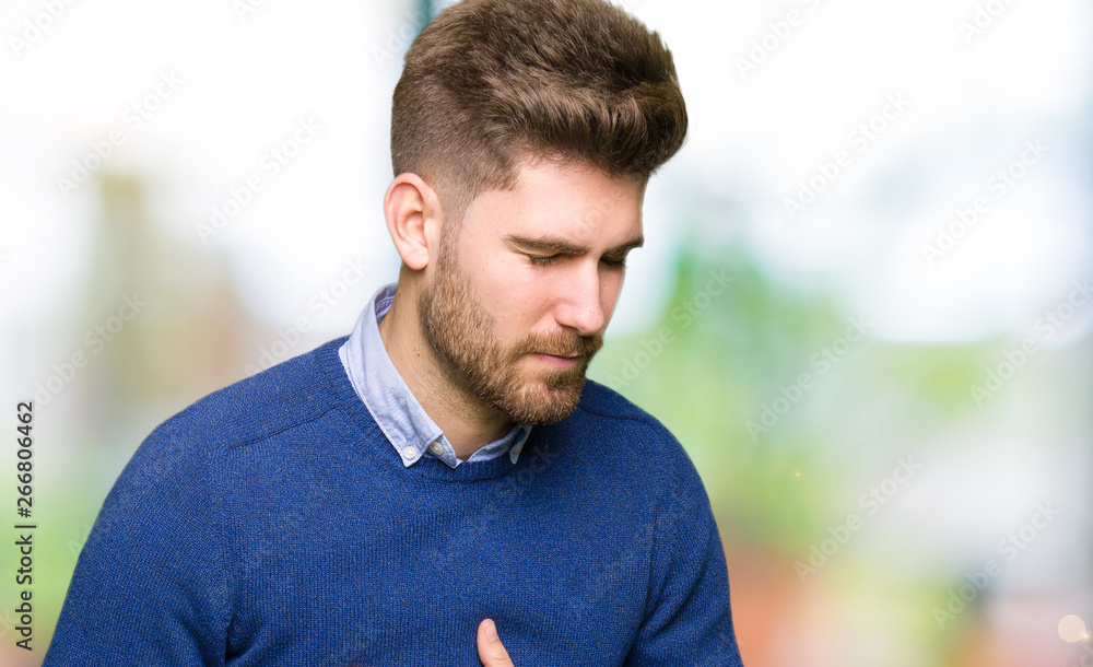 Young handsome bussines man with hand on stomach because indigestion, painful illness feeling unwell. Ache concept. Young handsome bussines man with hand on stomach because indigestion, painful illness feeling unwell. Ache concept.