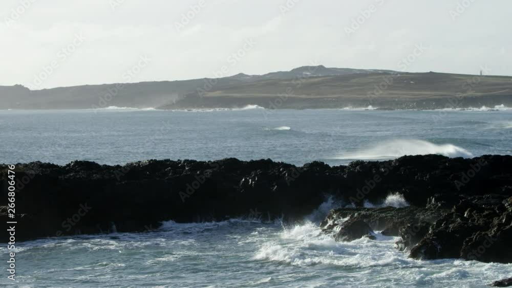 Iceland Coast Panorama, Waves Crash Over Black Volcanic Rock. Iceland Coast Panorama, Waves Crash Over Black Volcanic Rock.
