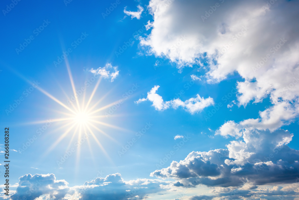 Summer background, wonderful blue sky with bright sun and clouds Summer background, wonderful blue sky with bright sun and clouds
