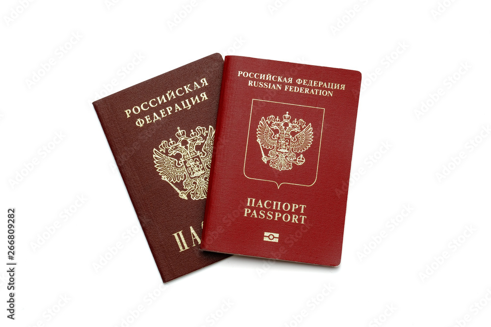Two red Russian passports on a white background. Isolated Two red Russian passports on a white background. Isolated