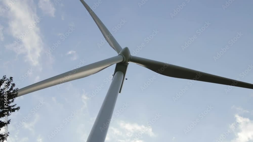 Bottom view on blade of electric windmill. Camera rotates. Bottom view on blade of electric windmill. Camera rotates.