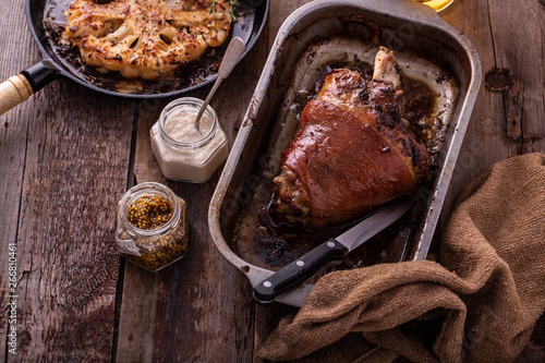 Photography Honey glazed pork knuckle with beer. copy space