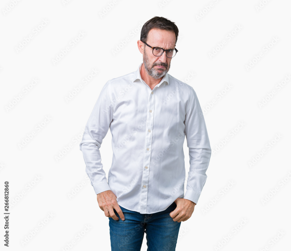 Handsome middle age elegant senior business man wearing glasses over isolated background skeptic and nervous, frowning upset because of problem. Negative person. Handsome middle age elegant senior business man wearing glasses over isolated background skeptic and nervous, frowning upset because of problem. Negative person.