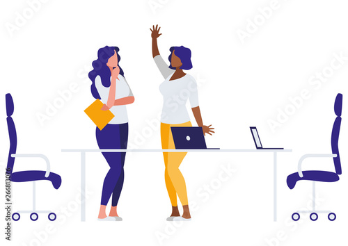 elegant interracial businesswomen in the office scene