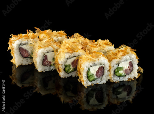 Set sushi roll. Traditional Japanese cuisine. Isolated on black background