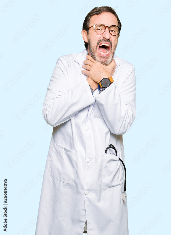 Middle age doctor men wearing medical coat shouting and suffocate because painful strangle. Health problem. Asphyxiate and suicide concept. Middle age doctor men wearing medical coat shouting and suffocate because painful strangle. Health problem. Asphyxiate and suicide concept.