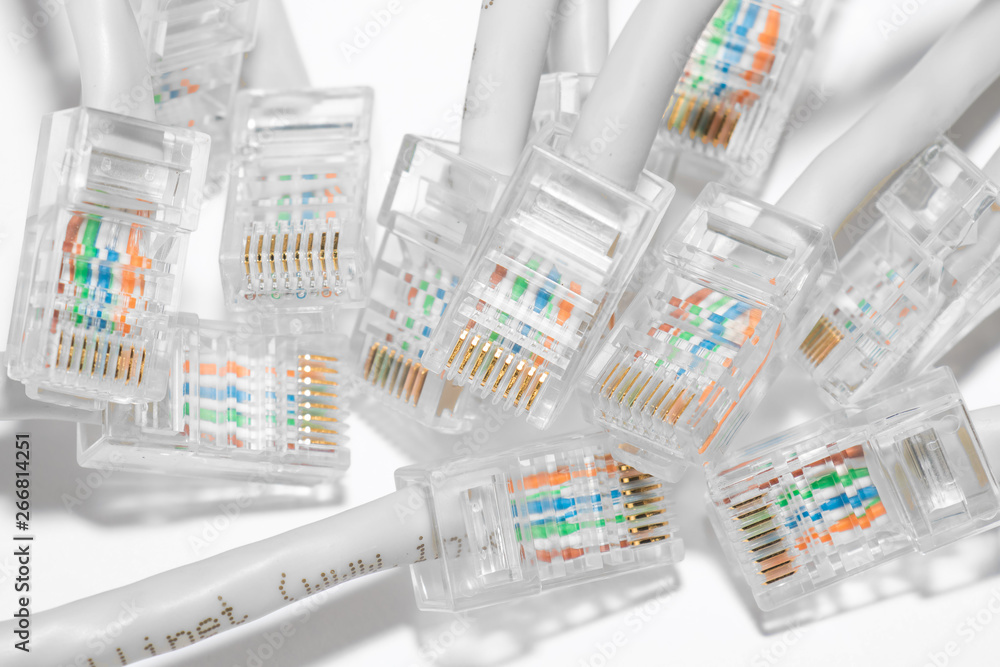 Close-up of many rj-45 connectors on isolated white background Close-up of many rj-45 connectors on isolated white background