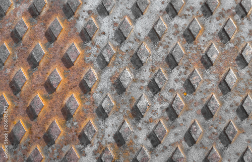 Closeup of a rusty manhole cover