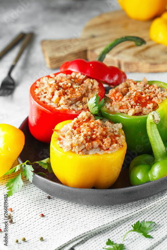 Colorful stuffed peppers with rice and minced meat. Stuffed paprika with rice and meat photo