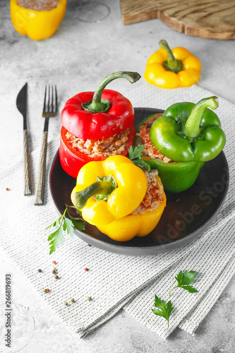 Colorful stuffed peppers with rice and minced meat. Stuffed paprika with rice and meat photo