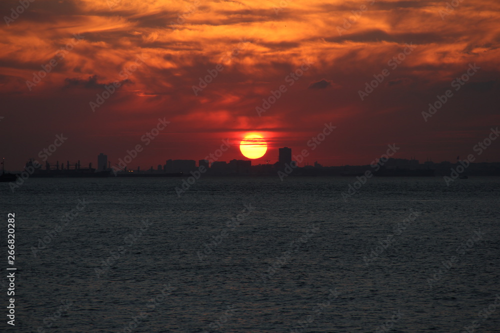 Blue sea and red sky Blue sea and red sky
