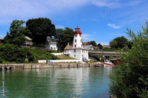 Kincardine, Ontario Lighthouse reflects in pristine inlet of Lake Huron