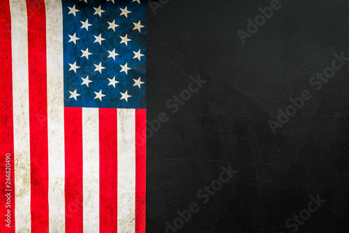 Memoral day of United States of America with flag on black background top view mock up photo