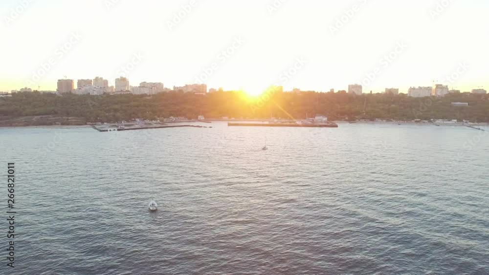 Aerial view from copter of Odessa coastline on sunset with sailing yachts. Aerial view from copter of Odessa coastline on sunset with sailing yachts.