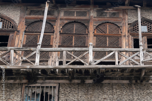 Abandoned building in old town Srinagar, Jammu and Kashmir, India. Ancient architecture buildings wooden window and the old brick wall houses at Srinagar is travel attraction 