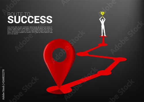 Silhouette of businessman with trophy at end of route. business concept of championship and route to success